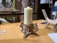 A Christmas table candle holder in oak